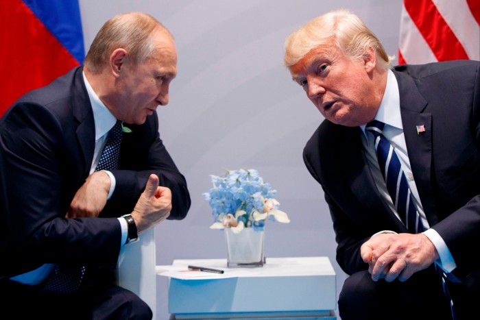 Vladimir Putin and Donald Trump at a meeting in 2017