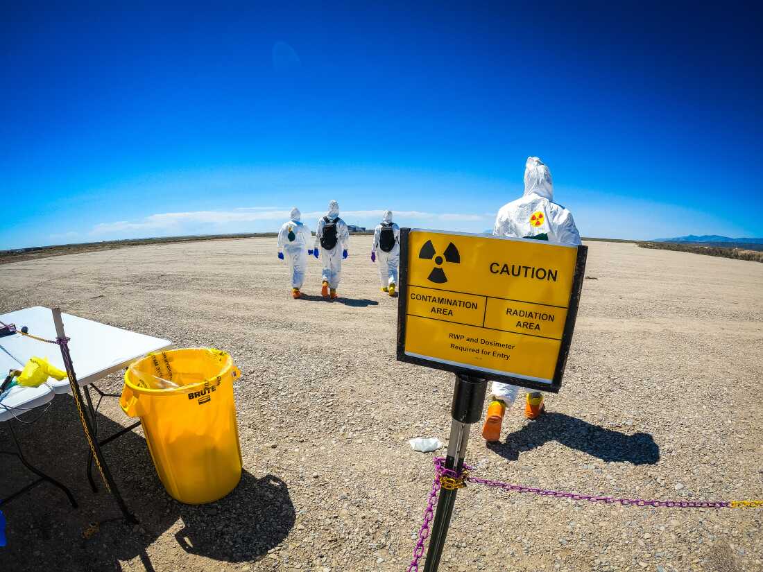 Members of the Nuclear Emergency Support Team training for a radiological contamination scenario.